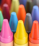 Close up of colorful and pastel crayons