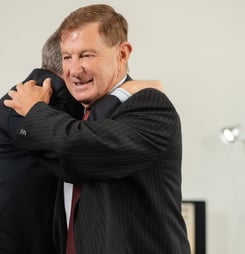 hug an economist day