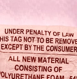 tear the tags off the mattress day