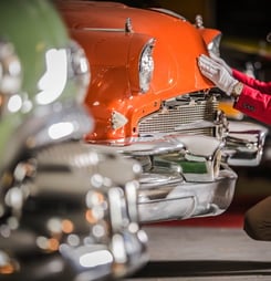 Men Taking Close Look on the Vehicle. American Classic Car Appraisal.
