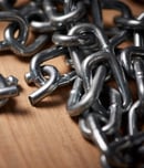 Shot of metal chains with a broken link