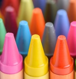 Close up of colorful and pastel crayons