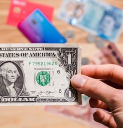 give someone a dollar day