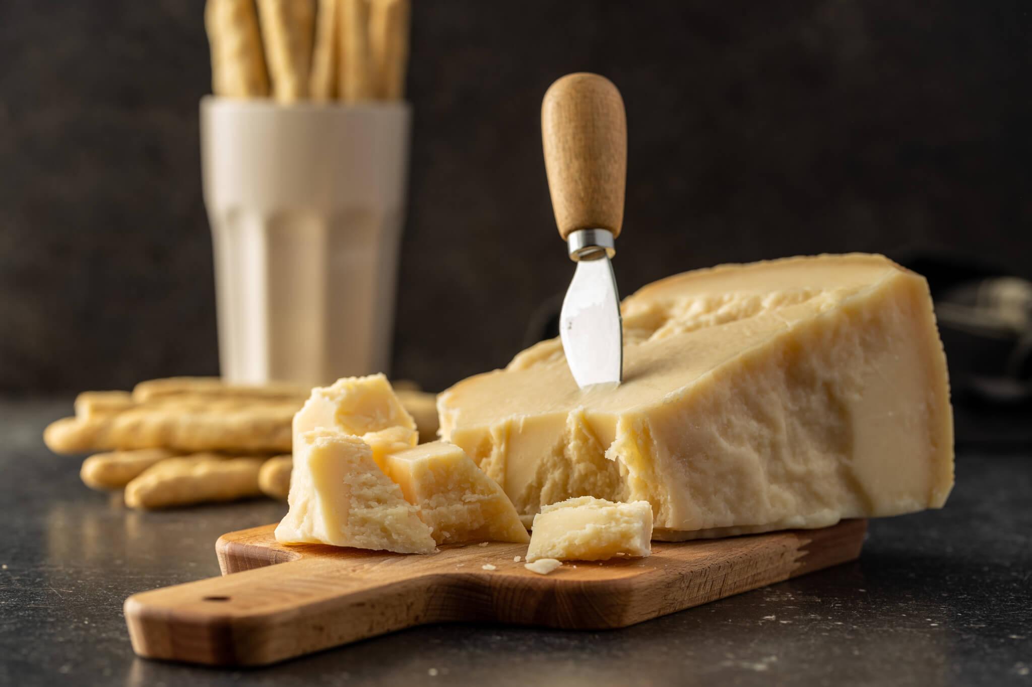 https://www.daysoftheyear.com/wp-content/uploads/pieces-of-italian-parmesan-cheese-block-of-parmes-2021-09-04-16-27-13-utc.jpg