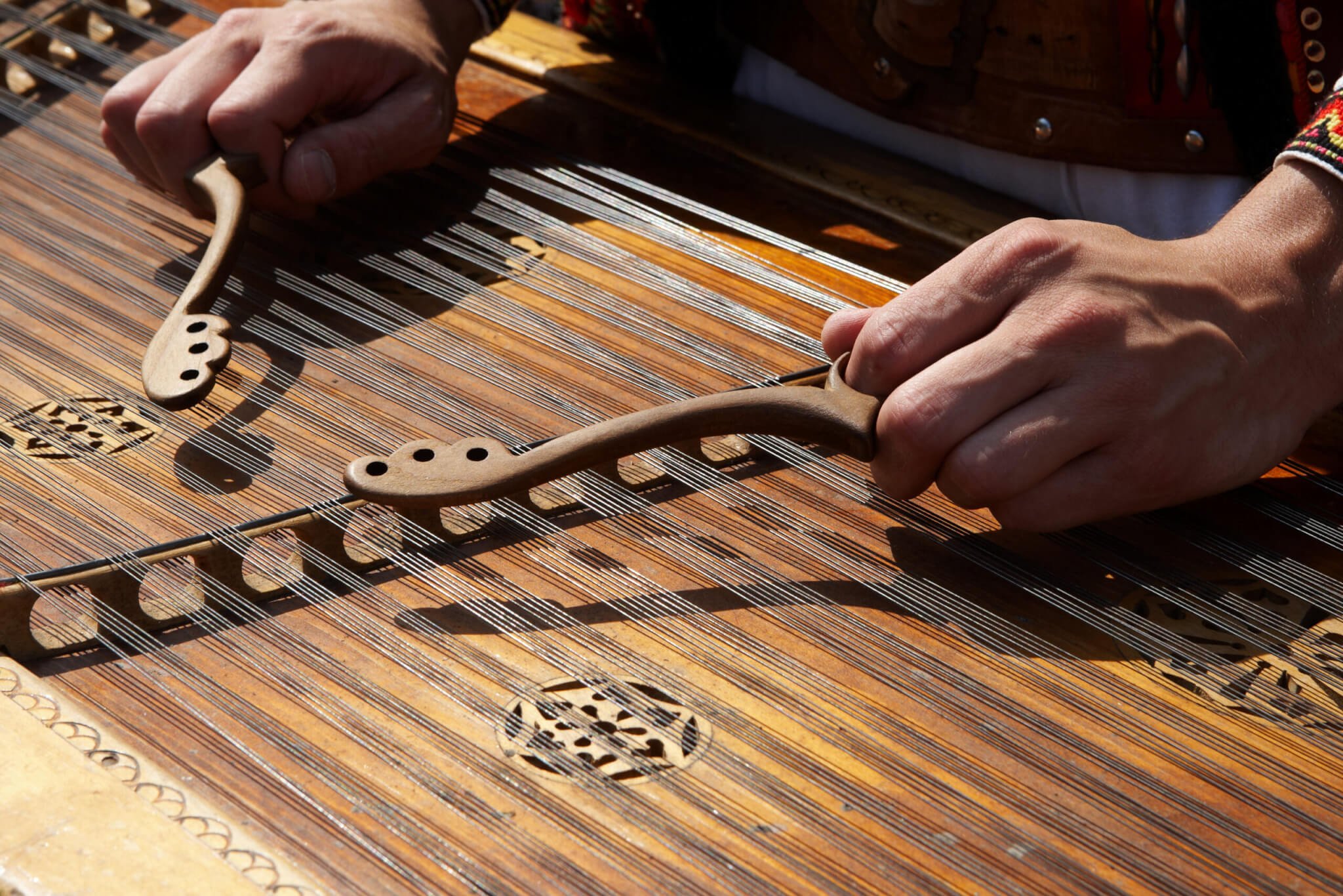 Uncommon clearance string instruments